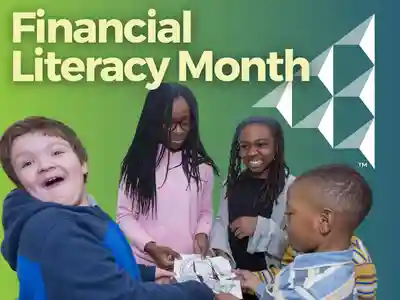 High school students smiling and teaching elementary students.